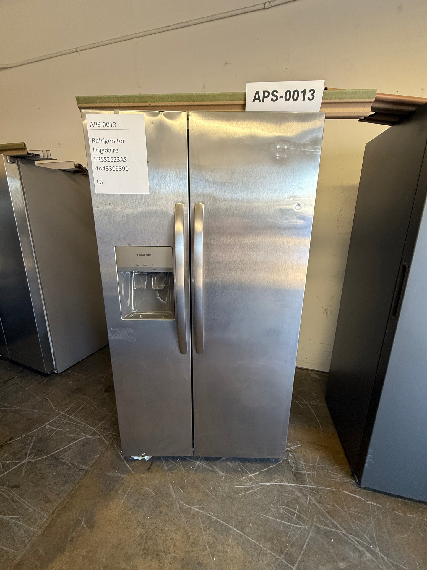 Frigidaire 25.6 cu ft Side - by - Side Refrigerator, Stainless, External Water/Ice Dispenser (FRSS2623AS) - Appliance Saver Store
